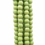 Perline verdi in ceramica 6.3x5.7 mm filo 32 cm 