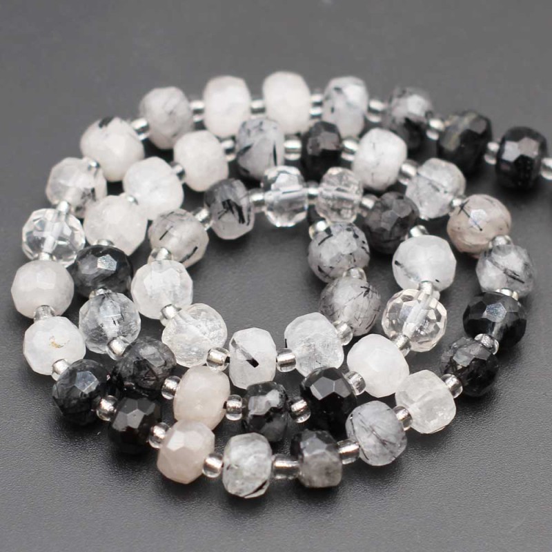 Rondelle pietre dure quarzo rutilato 7.5x6 mm sfacc. conf. 6 pz - ron-0p07 - pietreeminuterie.com Rondelle pietre dure quarzo rutilato 7.5x6 mm sfacc. conf. 6 pz (ron-0p07) - pietreeminuterie.com